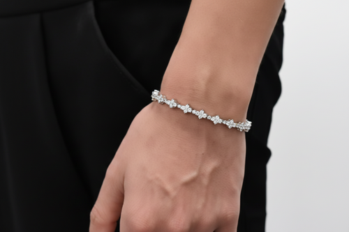 Iced out cross diamond bracelet.